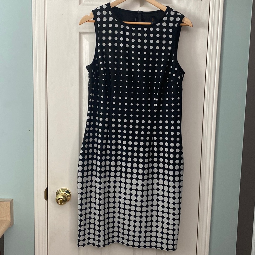 Black and grey polka dot knee length dress